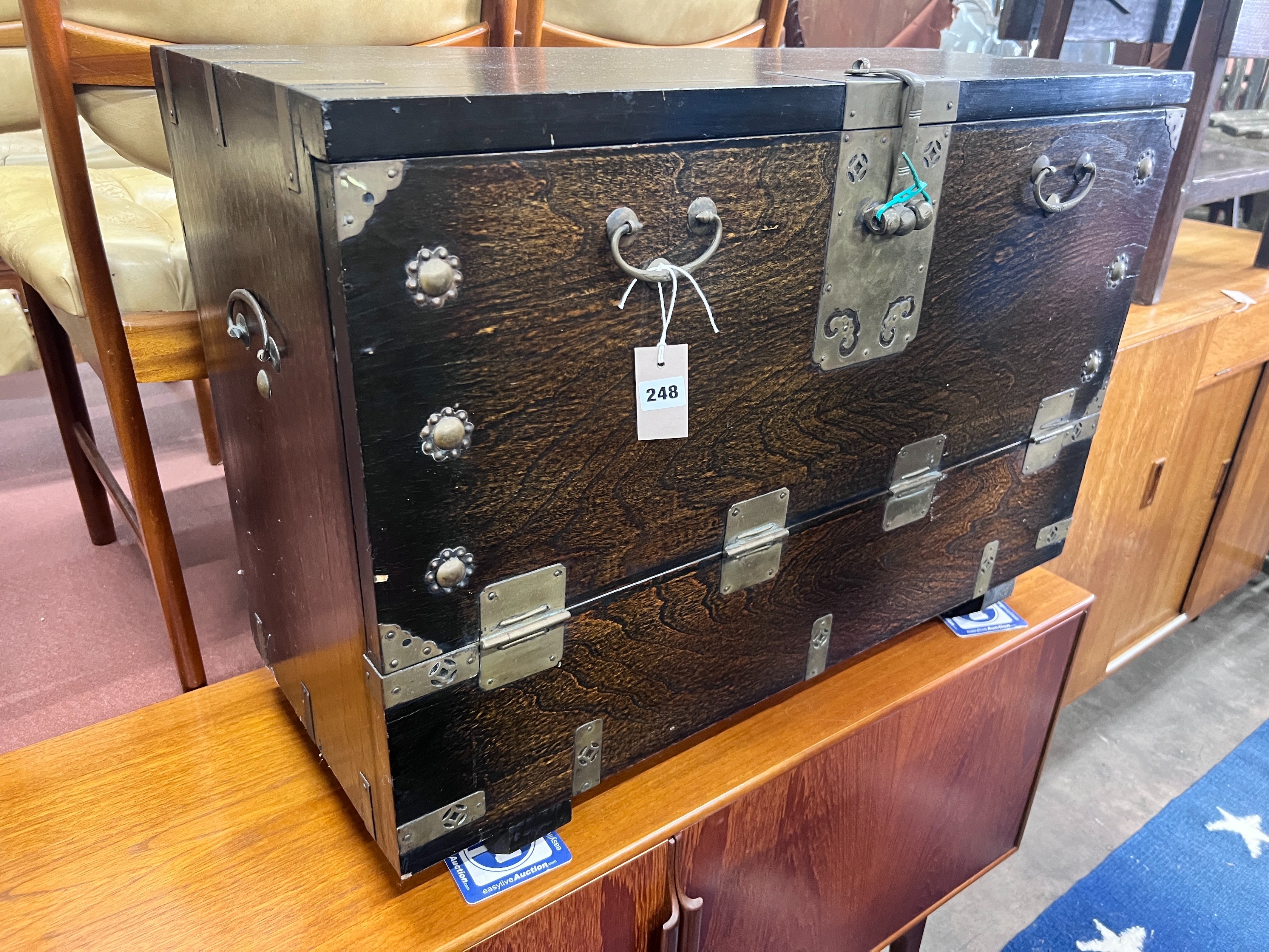 A Korean brass mounted ebonised wood trunk, width 85cm *Please note the sale commences at 9am.